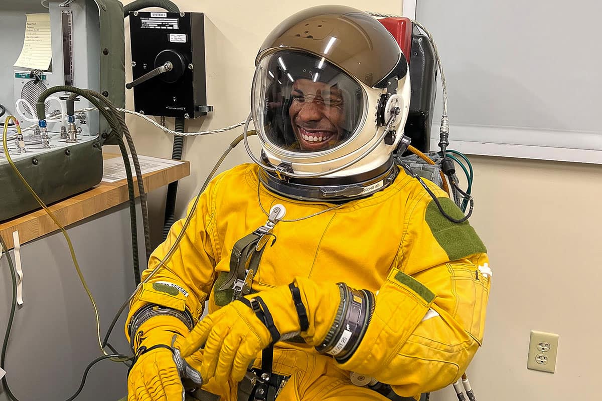 Jose Canales, a graduate Human Factors student at Embry‑Riddle’s Worldwide Campus, tests a pressurized suit used by U-2 pilots during his aerospace and operational physiologist internship with the U.S. Air Force 9th Reconnaissance Wing. (Photo: Embry‑Riddle/Jose Canales)