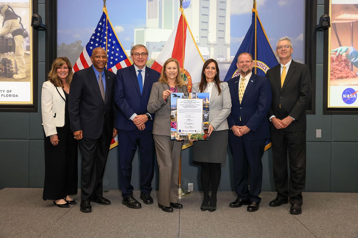 Kennedy Space Center Director and charter members of the Florida University Space Research Consortium signed a memorandum of understanding on Jan. 8, 2025. From left to right: Jennifer Kunz, Associate Director, Technical, Kennedy Space Center; Kelvin Manning, Deputy Director, Kennedy Space Center; Dr. Kent Fuchs, Interim President, University of Florida; Janet Petro, Director, Kennedy Space Center; Jeanette Nuñez, Florida Lieutenant Governor; Dr. Alexander Cartwright, President, University of Central Florida; Dr. Barry Butler, President, Embry‑Riddle Aeronautical University. (Photo: NASA/Kim Shiflett)