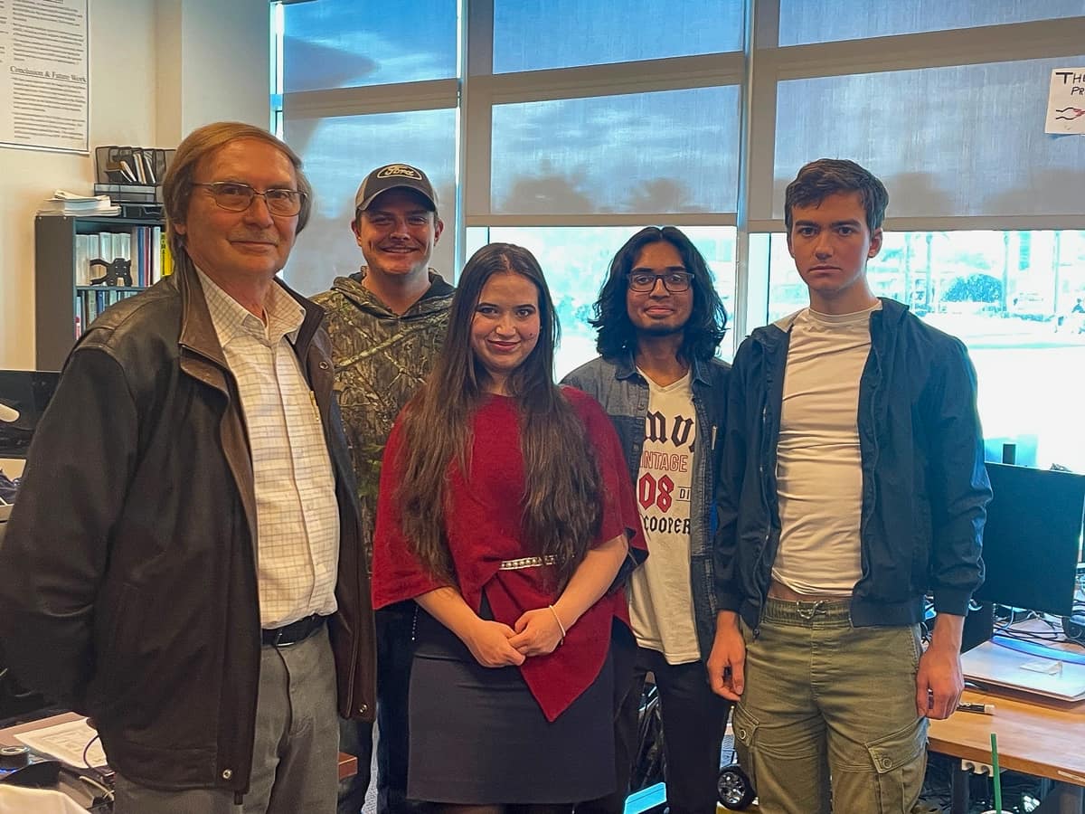 A team of Embry‑Riddle students was recently selected to compete in NASA’s Lunar Autonomy Challenge. Pictured in the Engineering Physics Propulsion Lab with faculty advisor Dr. Sergey V. Drakunov are (from left) undergraduates Devon Casados, Katherine Campbell, Gregory Dsouza and Marshall Yelvington. (Photo: Embry‑Riddle/Melanie Stawicki Azam)