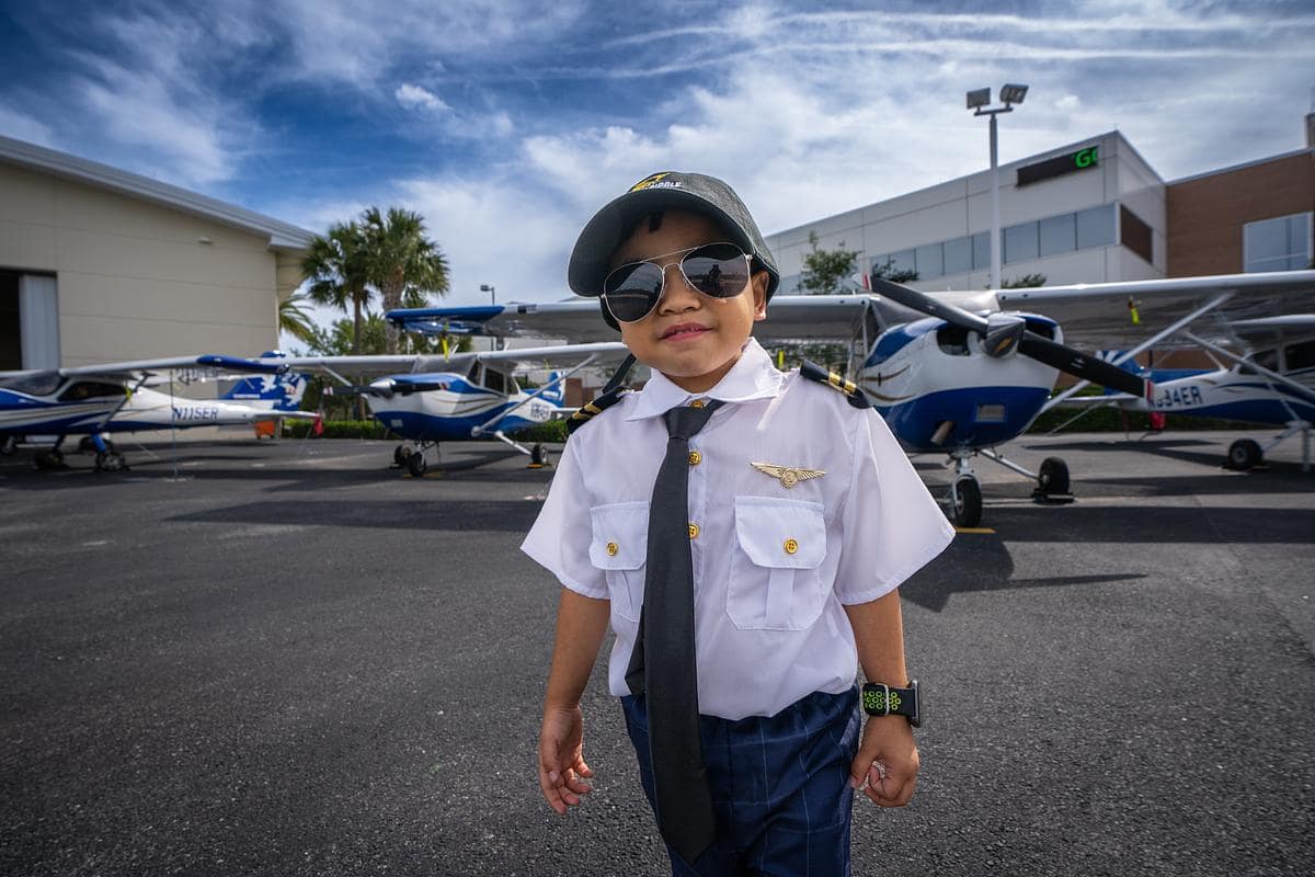 Kryzian Santos takes a tour of the Flight Line at Embry-Riddle Aeronautical University. The 3-year-old boy, who loves aviation, was made a pilot for a day through a collaboration with the Make-A-Wish Foundation of Central and Northern Florida.