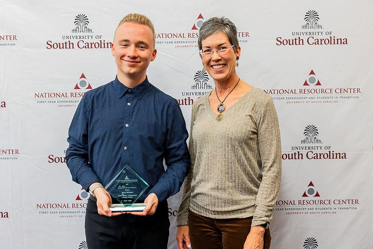 Aeronautical Science student Brock McHood has been awarded the Jordan Smith Fellowship for his dedication to fostering first-year student success. He was joined by Dr. Lisa Schlegel, director of First Year Experience at Embry‑Riddle, at the awards ceremony. (Photo: National Resource Center for The First-Year Experience, University of South Carolina)