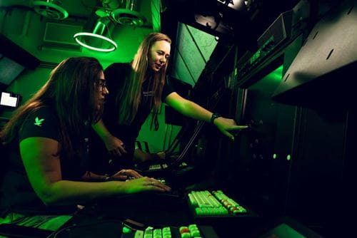 Kokenge works with Air Traffic Control lab manager Carol Martin. (Photo: Embry‑Riddle/Connor McShane and Wilson Van Ness)