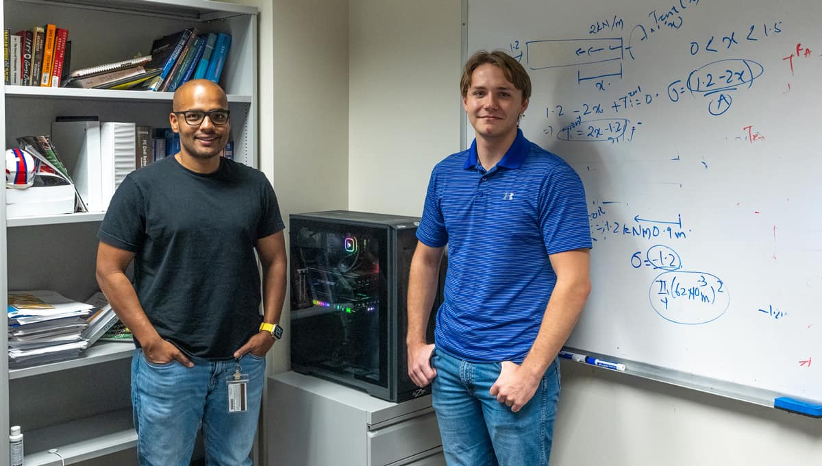 Dr. Siddharth Parida, assistant professor of Civil Engineering, and Aerospace Engineering student Anthony LoRe Starleaf worked together on developing a machine learning system to more efficiently analyze structures. (Photo: Embry‑Riddle/Daryl LaBello)