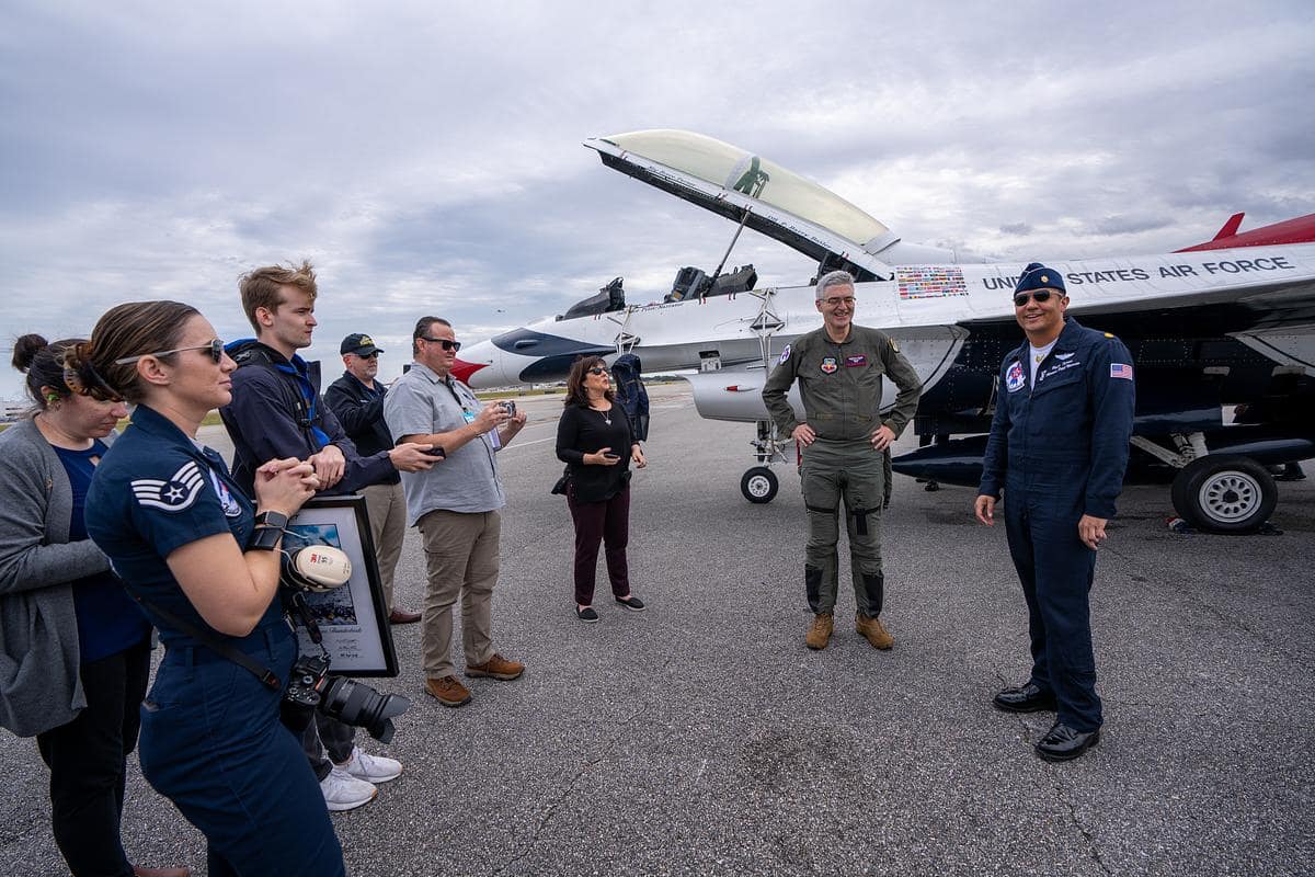 Embry‑Riddle President P. Barry Butler, Ph.D., poses with USAF Thunderbirds pilot Major Bryce “Triple” Turner Feb. 15, 2024, ahead of his flight over the Daytona Beach Campus. (Photo: Embry‑Riddle/David Massey)