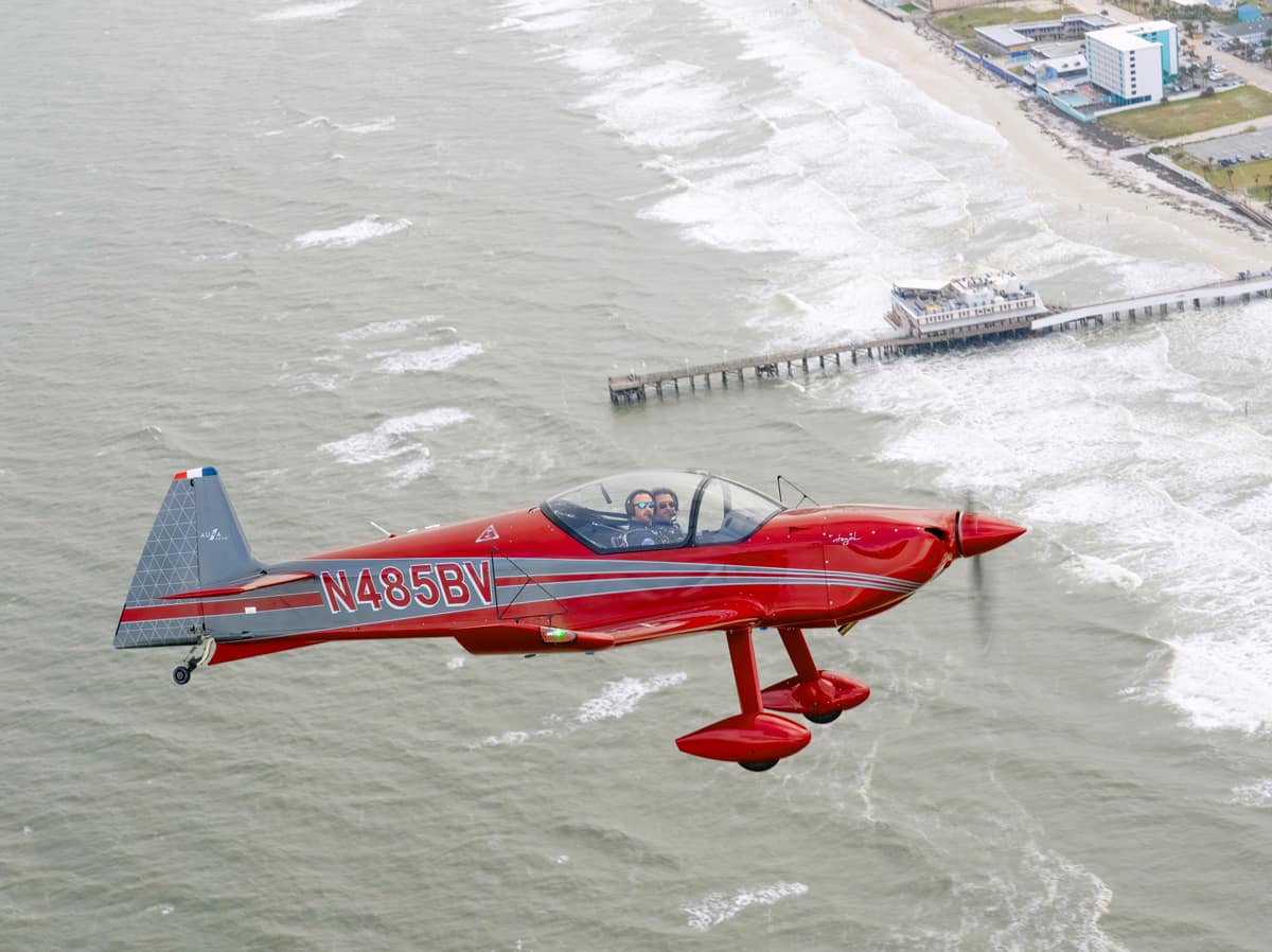 The AURA AERO Integral R flies over Daytona Beach.