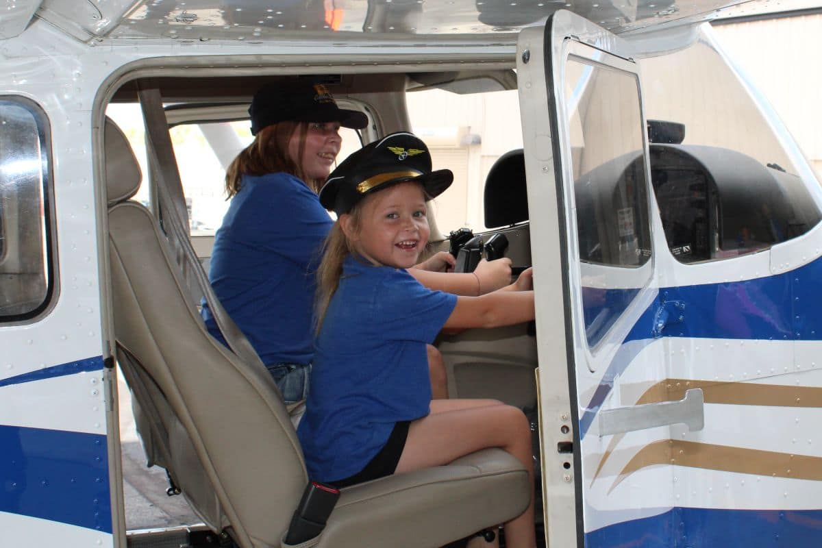 A participant in Girls in Aviation Day at Embry-Riddle’s Prescott Campus sits behind the controls of a Cessna 172.