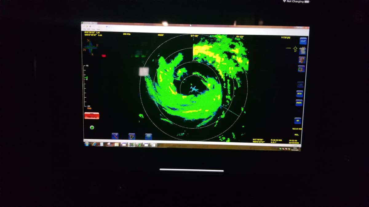 Hurricane Hunter shown inside the eye of Hurricane Melissa in radar tracking image.