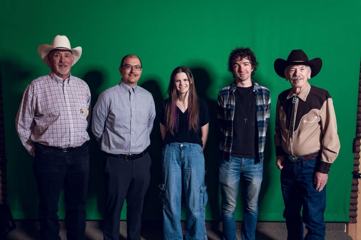 Embry‑Riddle Aeronautical University students collaborated with the Prescott Western Heritage Foundation to recreate scenes from Prescott’s Old West for the Western Heritage Center. From left: Doug Allen, Western Heritage Foundation project manager; Troy Barber, assistant director of annual giving programs at Embry‑Riddle; students Kayleigh Hasselmeier and Ethan Hammonds, who are Simulation Science, Games and Animation majors; and Dennis Gallagher, founder and CEO of the Prescott Western Heritage Foundation, Inc. (Photo: Embry‑Riddle/Western Heritage Foundation)