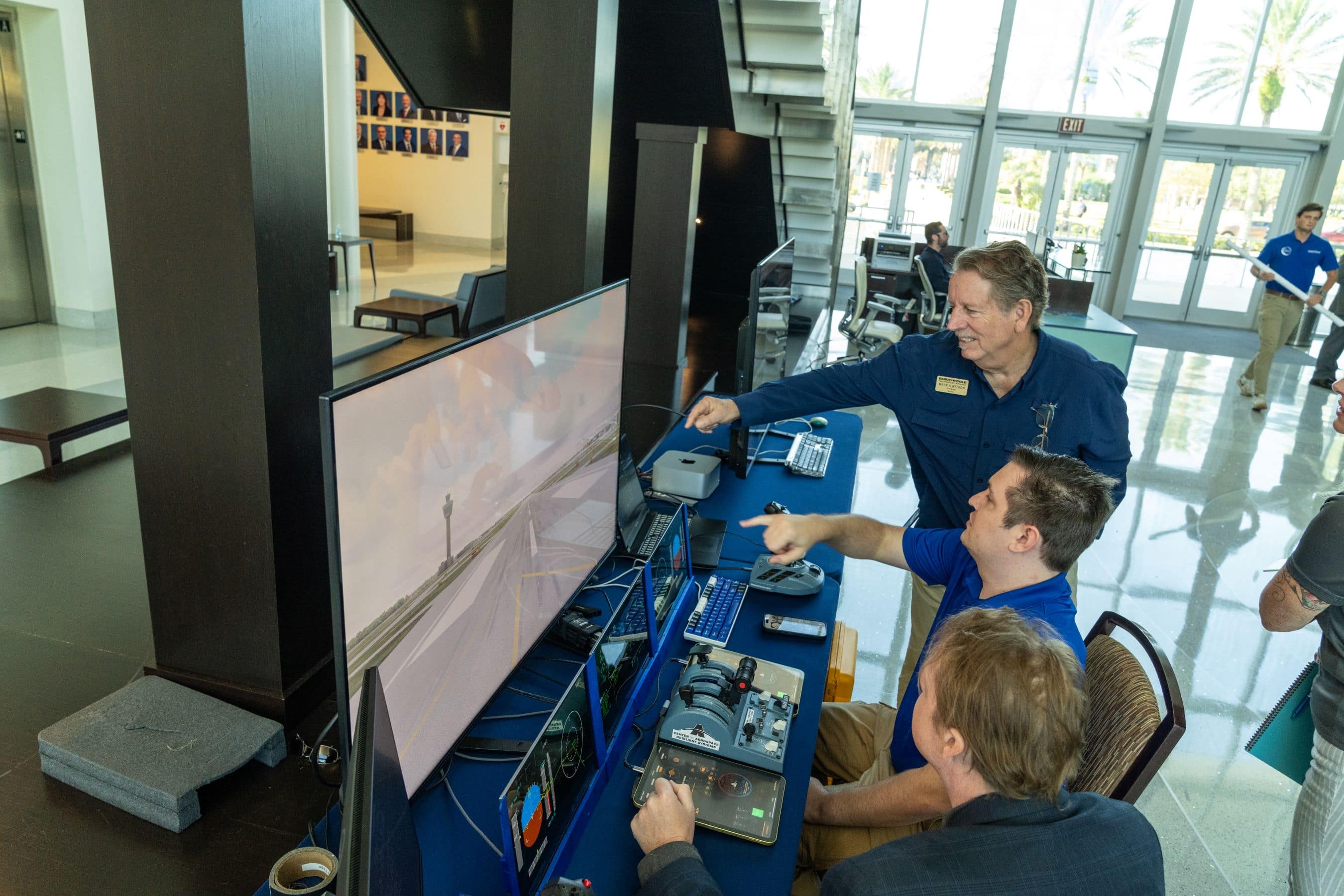  An Embry-Riddle AI Summit attendee checks out the Portable Cockpit Demonstrator.