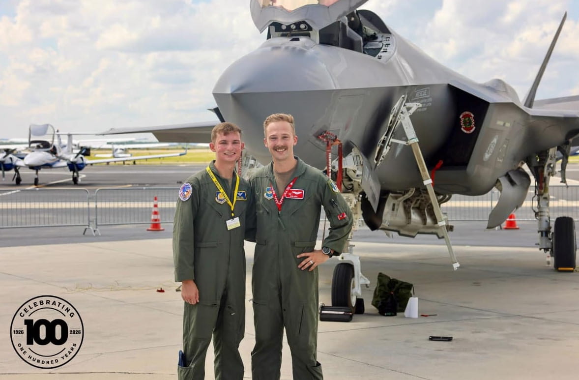 Captain Ian Mehl and his brother David in front of F-35.