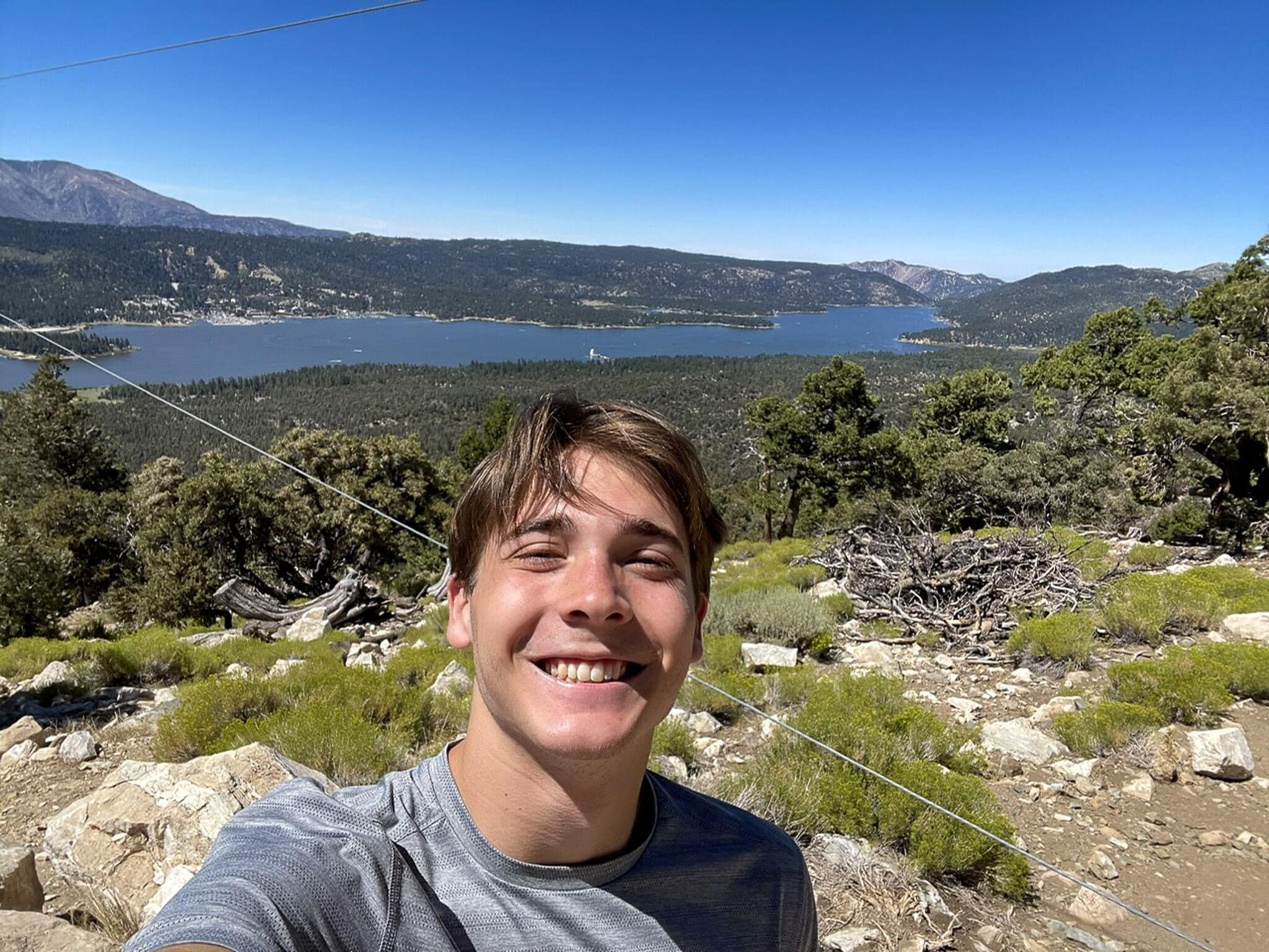 Logan Schierholz in front of solar observatory.