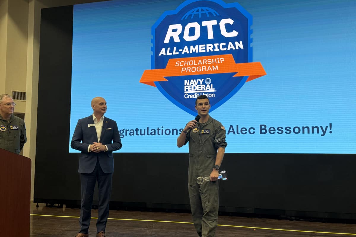 Embry-Riddle Aeronautical University Air Force ROTC Cadet Alec Bessonny accepts award.