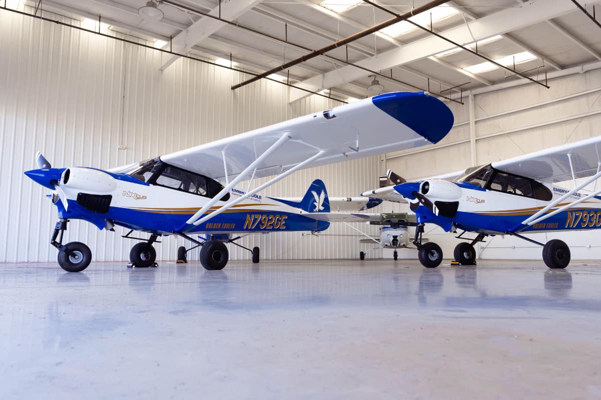 New CubCrafters NX Cubs await their next flight in the Prescott Campus hangar.