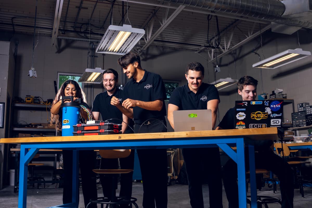 Student engineers from Embry-Riddle’s Prescott Campus PARSEC team collaborate on a prototype for their award-winning spacecraft fuel-gauge system.