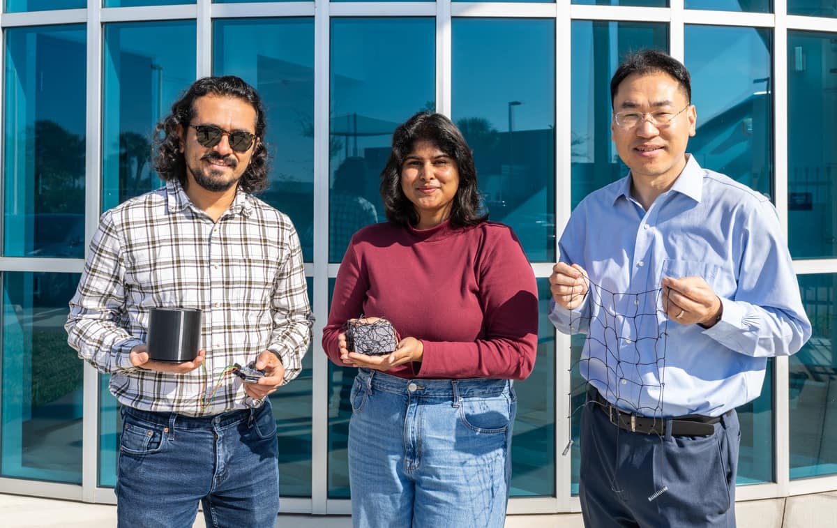 Embry-Riddle’s Dr. Morad Nazari, graduate student Sahasra Boyapati and Dr. Daewon Kim display prototype components.