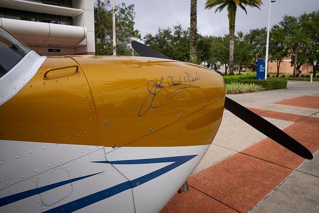 Founder John Paul Riddle’s signature is painted on the nose of the centennial-themed Cessna 172.
