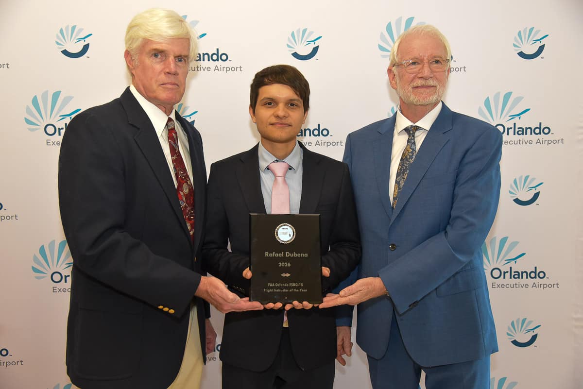 Embry-Riddle flight instructor Rafael Dubena receives an award.