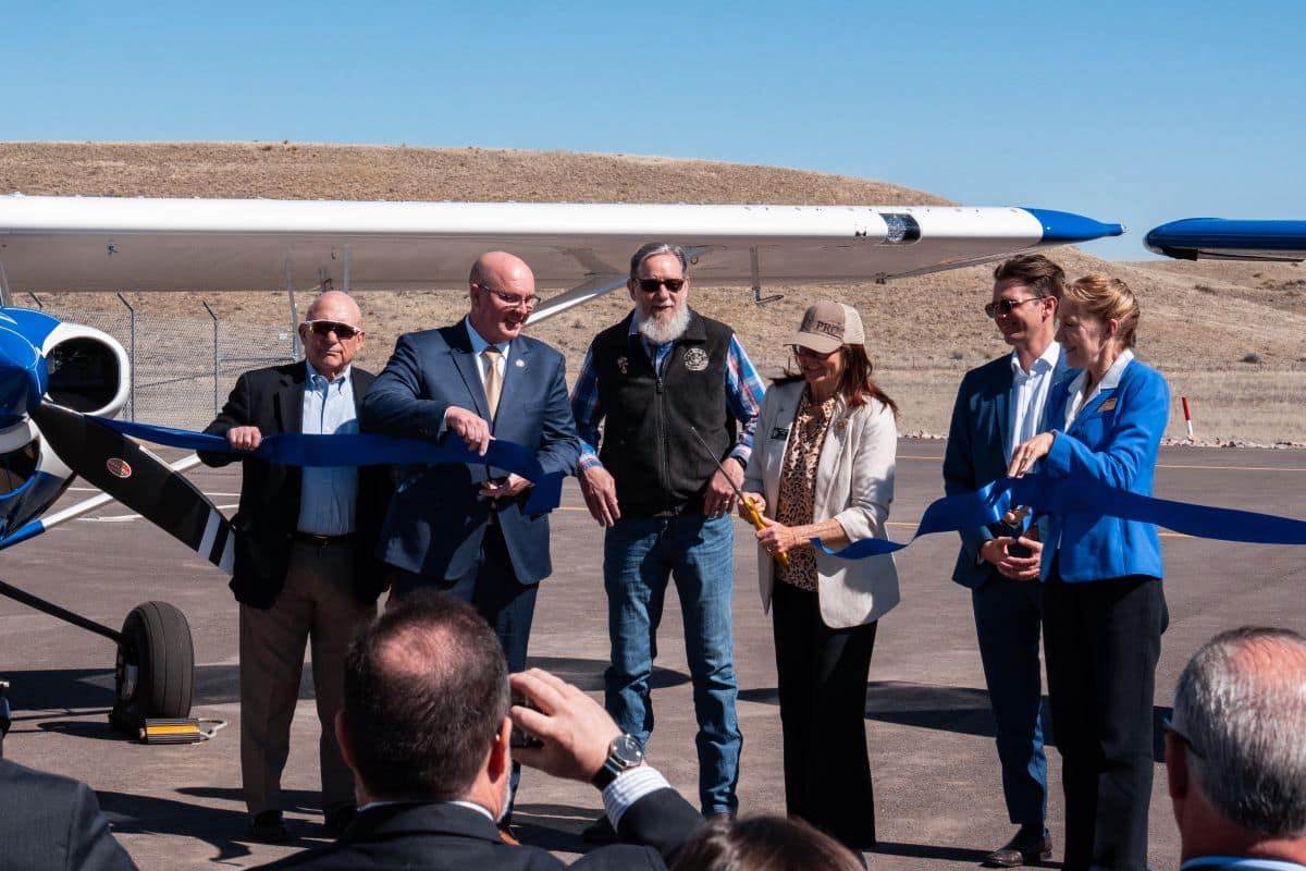 City, state, and Embry-Riddle officials gather to celebrate a ribbon-cutting ceremony at Embry-Riddle's northern flight operations facility within the city of Prescott's Strategic Academic Flight Education Complex.