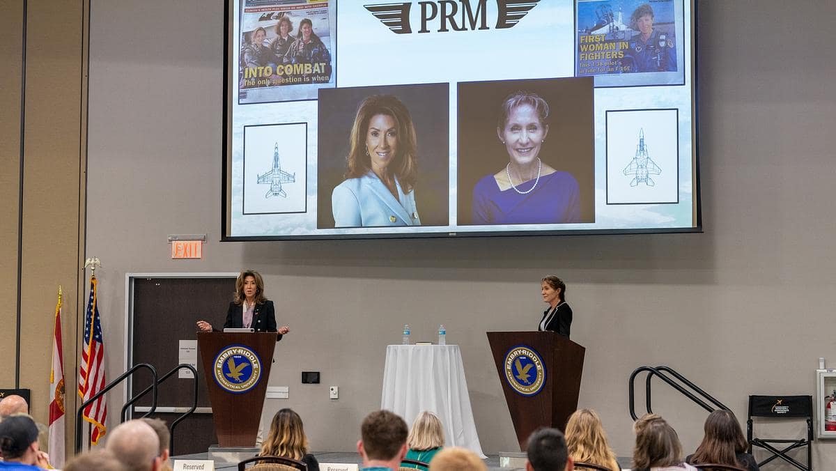 Tammi Jo Schults and Maj. Gen. Leavitt at podiums.