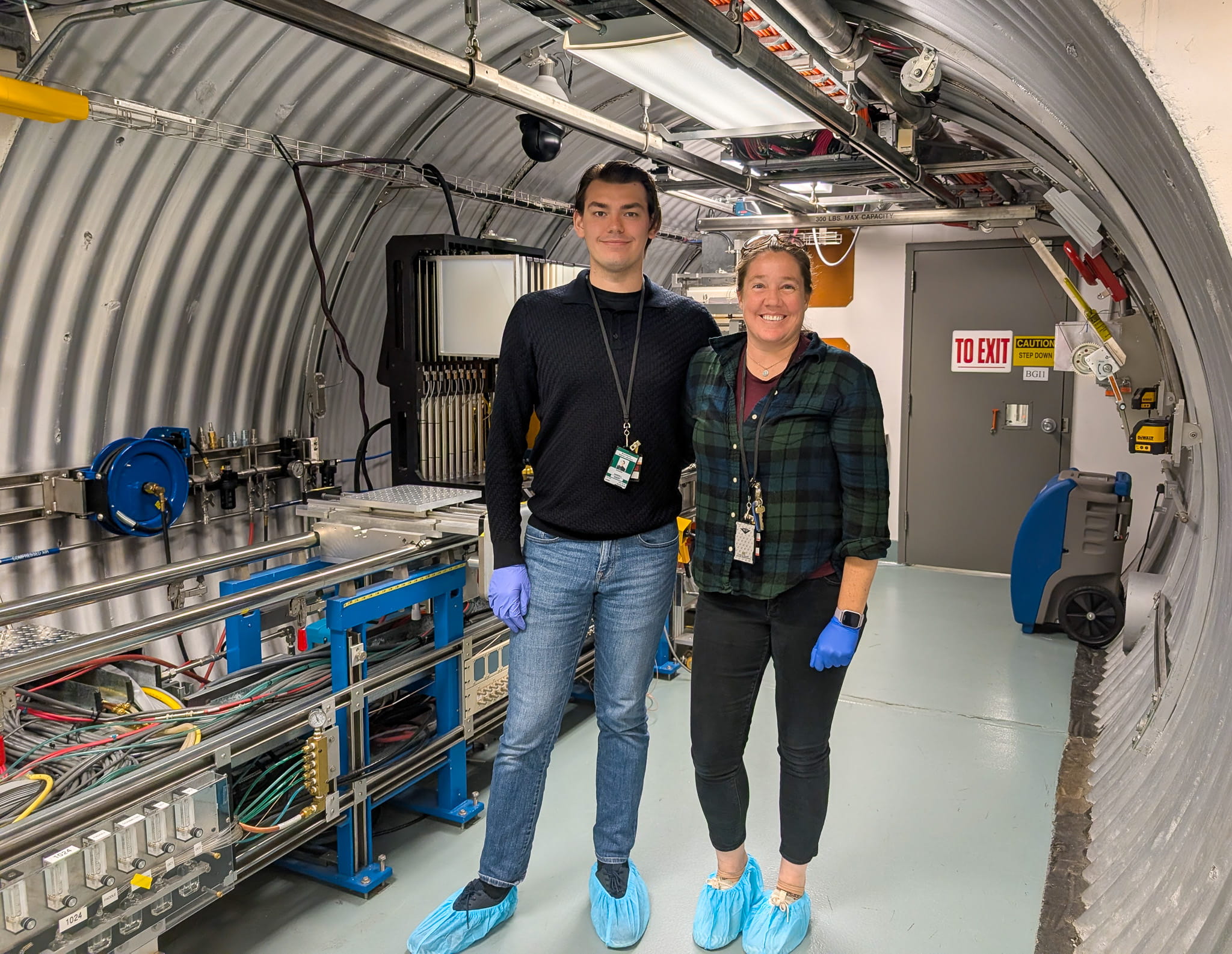 Cassandra Juran and recent graduate Dominic Sandell in the NASA Space Radiation Lab Beam Line, an accelerator where their biological models were exposed to radiation.