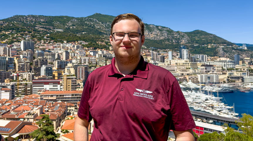 Man in front of skyline of Monaco