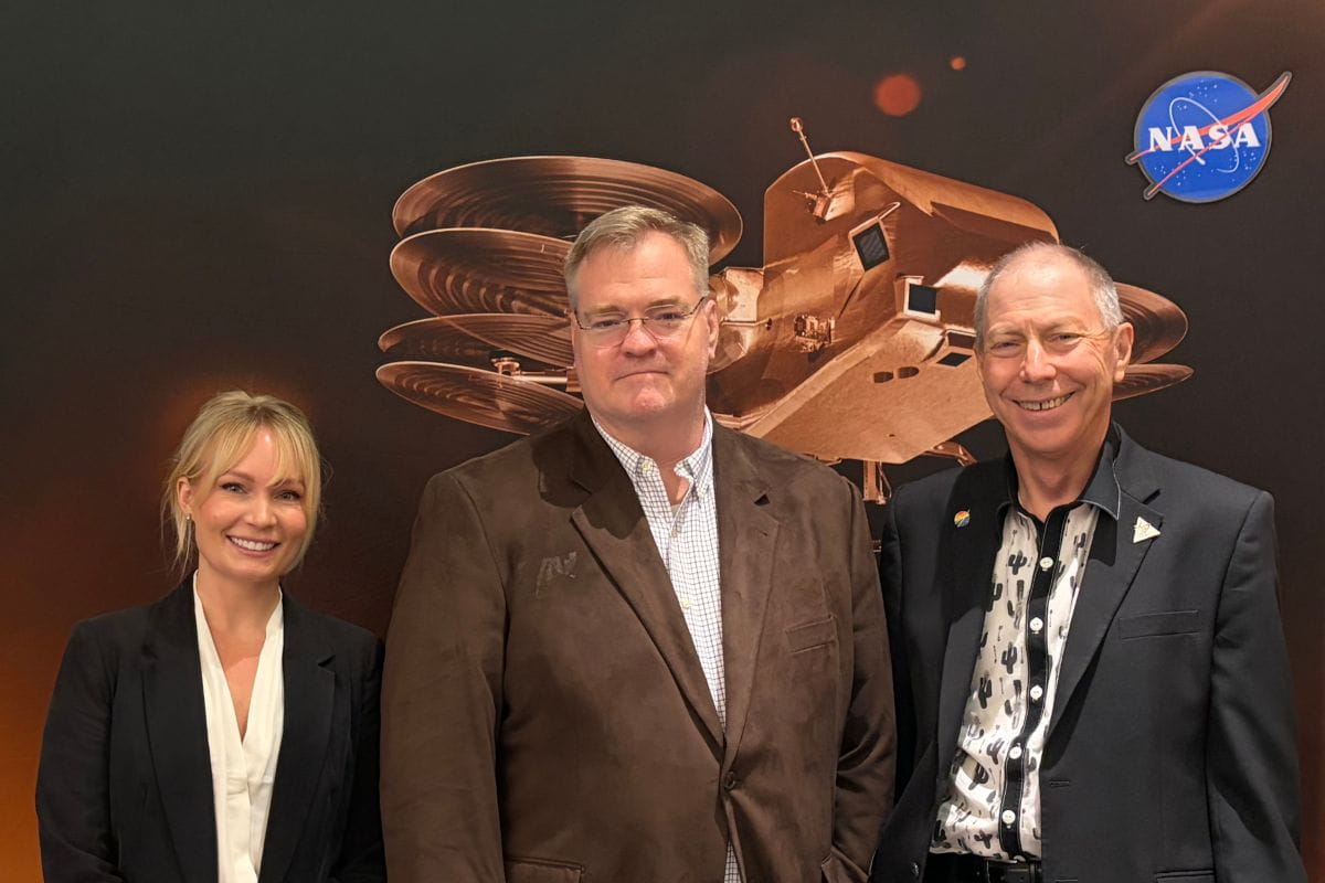 Embry-Riddle professor Dr. Elliott Bryner (center) stands with Michelle Coe, program manager for the Arizona NASA Space Grant Consortium, and consortium director Dr. Timothy Swindle. 