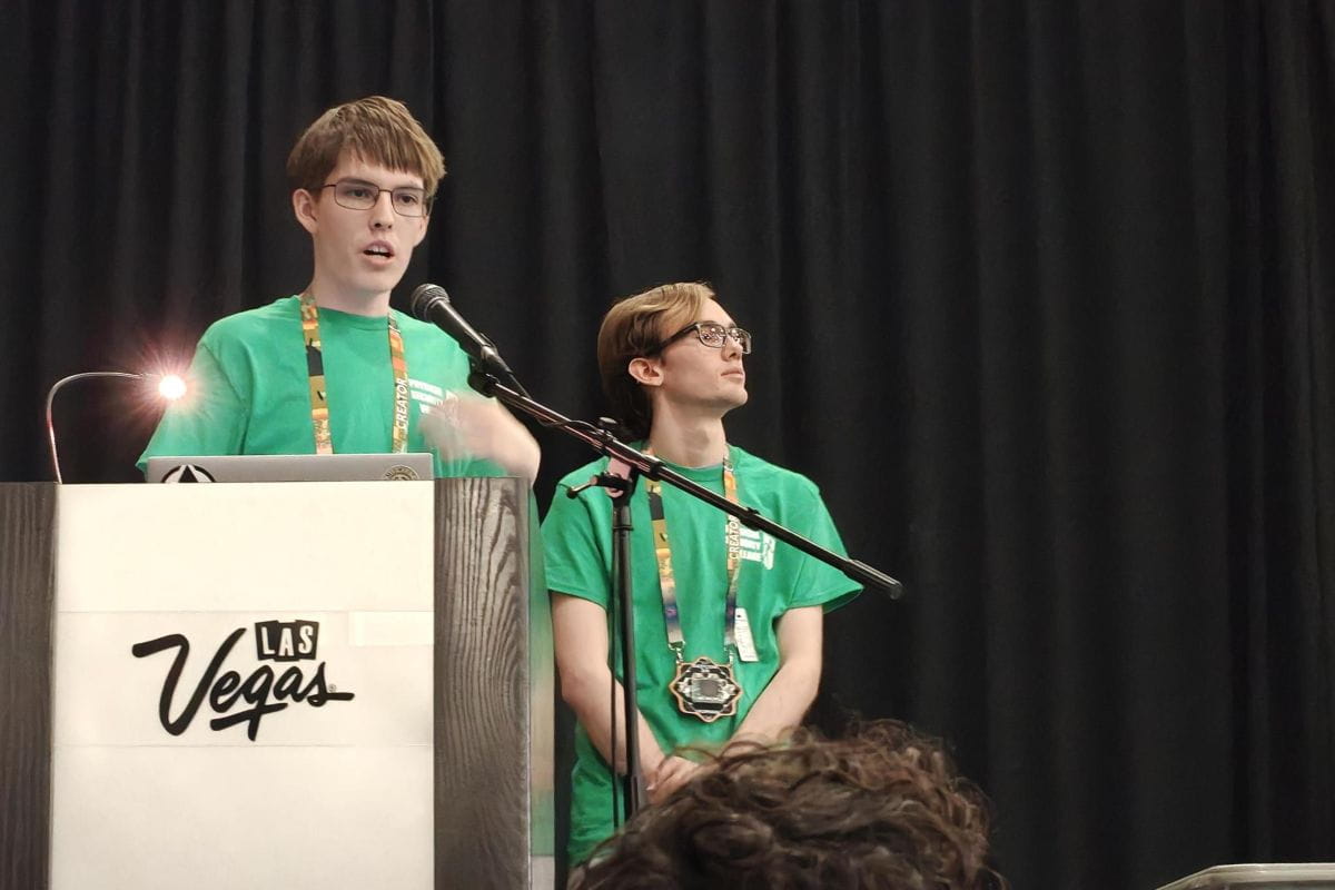 Embry-Riddle students Aaron Tulino (left) and Benjamin Higgins (right) presented their research, “Zero-Knowledge Unsaflok: The Unsaflok Saga Continues,” at DEF CON 34 in Las Vegas. (Photo: Benjamin Higgins)