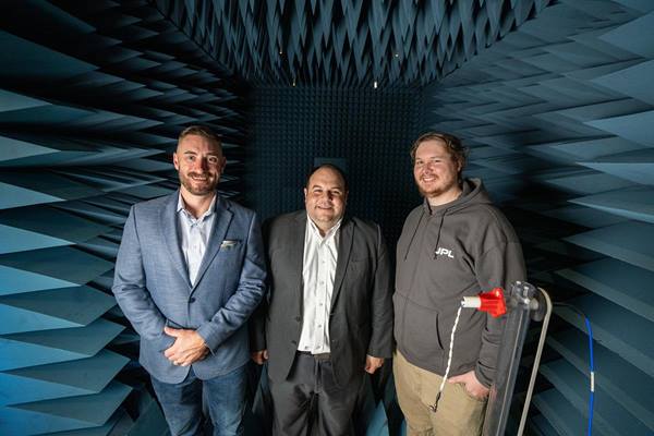 Ryan Clayton, Dr. Eduardo Rojas-Nastrucci and Blake Roberts pose inside of the WiDE Lab’s Anechoic Chamber at Embry-Riddle's MicaPlex. 