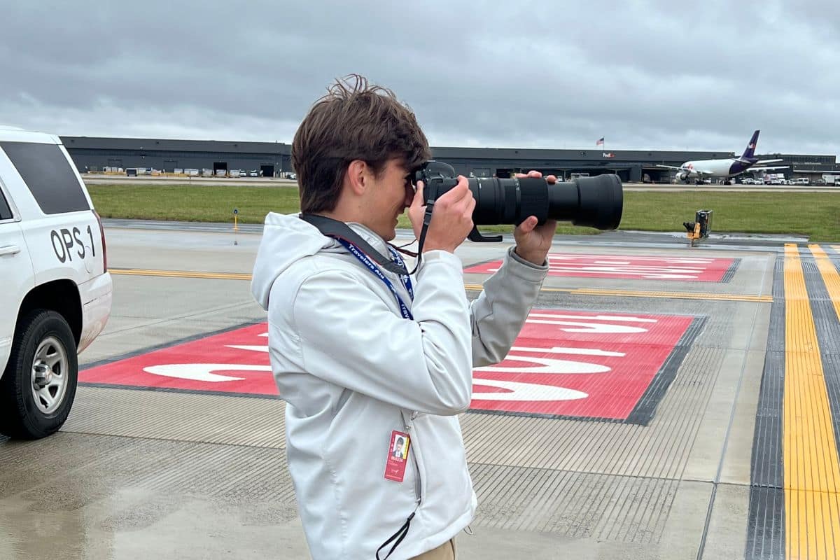 Embry-Riddle undergraduate Noah Escobar photographs aircraft from the ramp while plane spotting at Washington Dulles International Airport in Virginia.