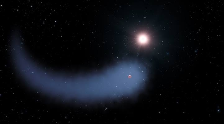 This photo of the exoplanet Awohali, formerly known as GJ 436 b, shows its comet-like tail, made up of hydrogen being stripped off of the planet by its partner star