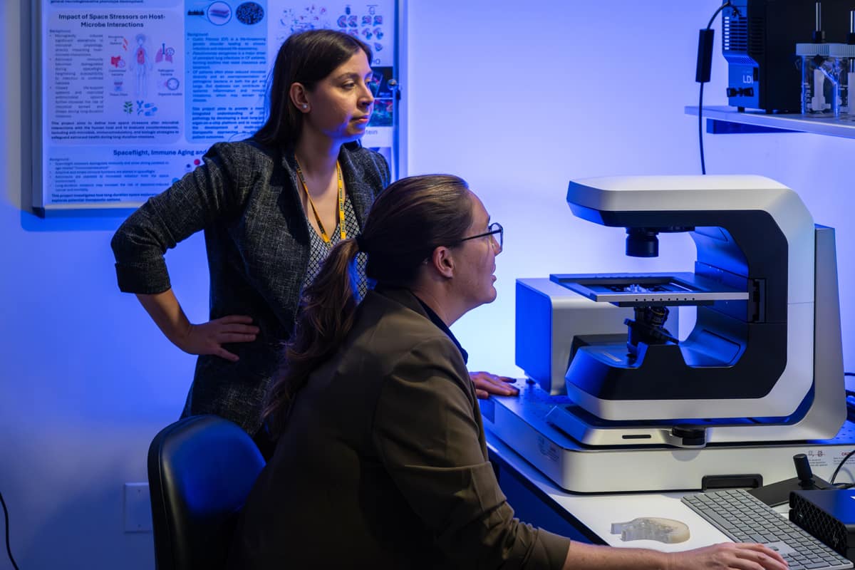 Dr. Emel Sen Kilic and Dr. Cassandra Juran are co-directors of Embry-Riddle’s new SPACE lab, where they are leading their students in advanced science to counter the effects of spaceflight on astronauts — research that could also deliver health benefits for humans here on Earth. Here, they observe the interior structure of space-flown mouse bone visualized with confocal microscopy.