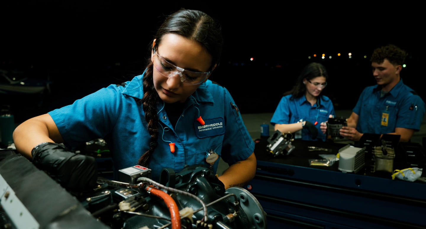 Young professionals in aviation maintenance.