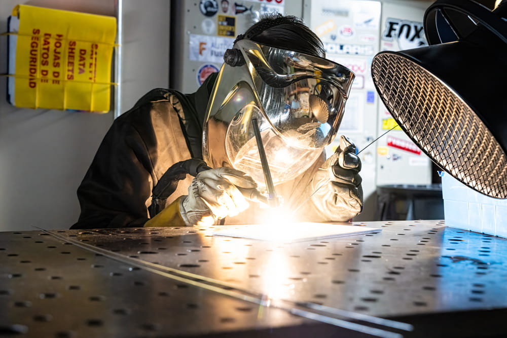 Embry-Riddle student welds in the lab