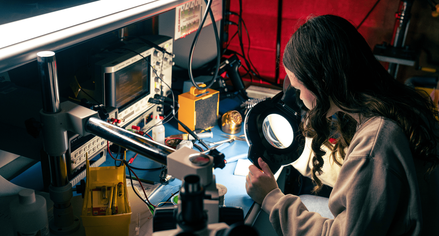 Electrical engineer in a lab environment.
