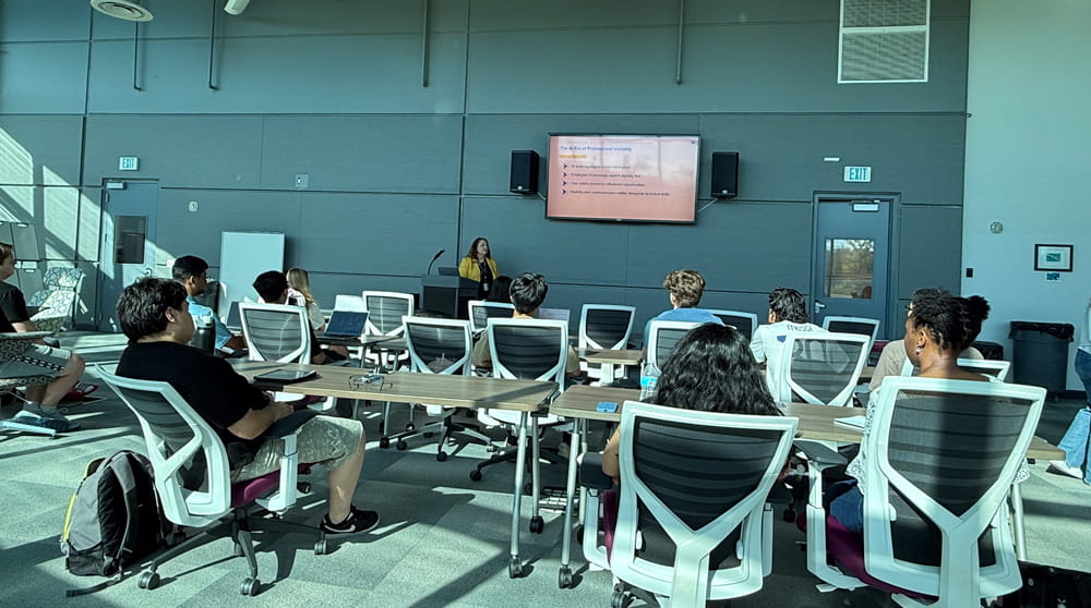 Students watch a presentation at the MicaPlex