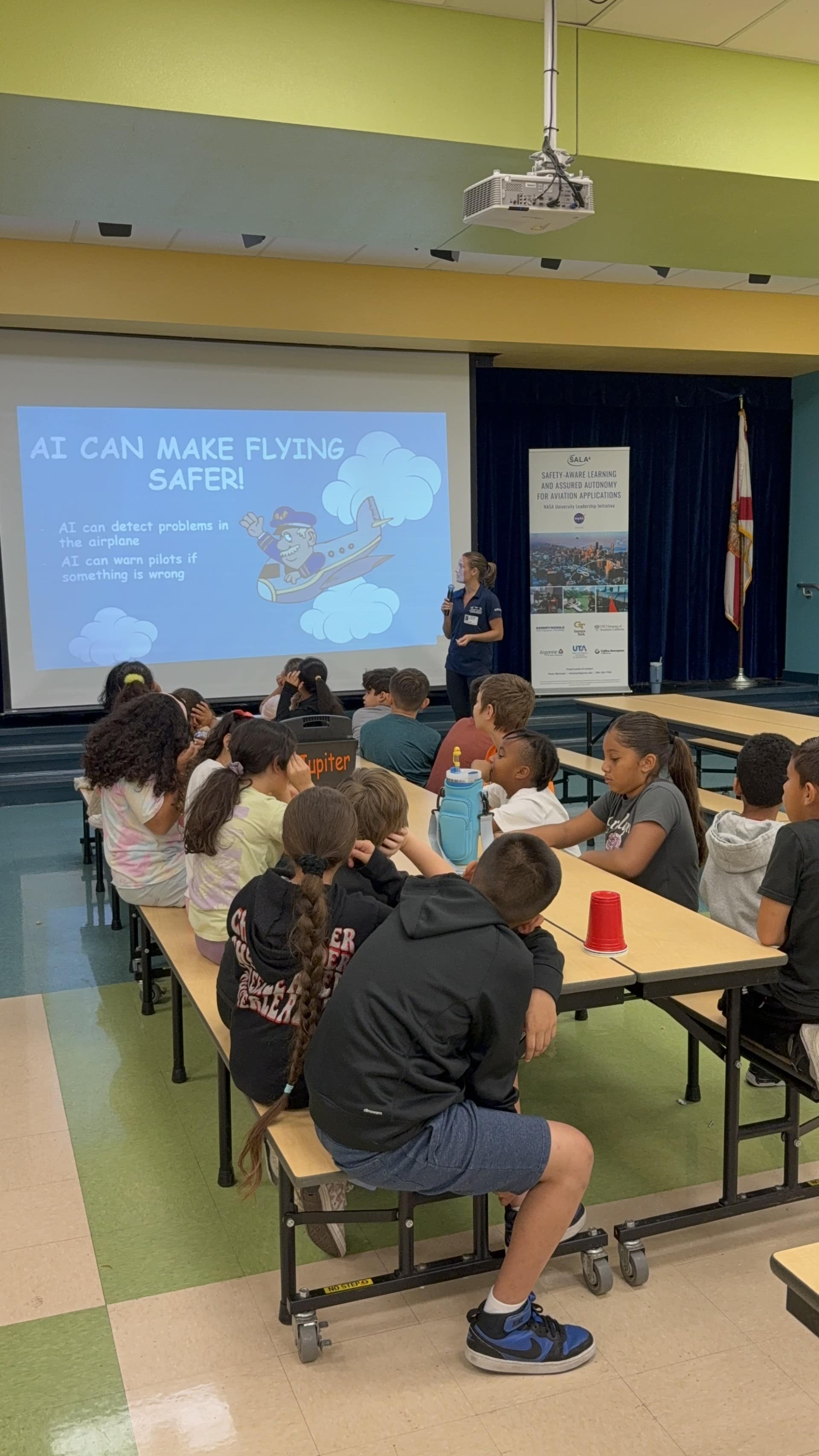 Students listen to a lecture during STEM day