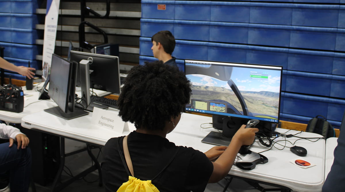 Students work on a computer