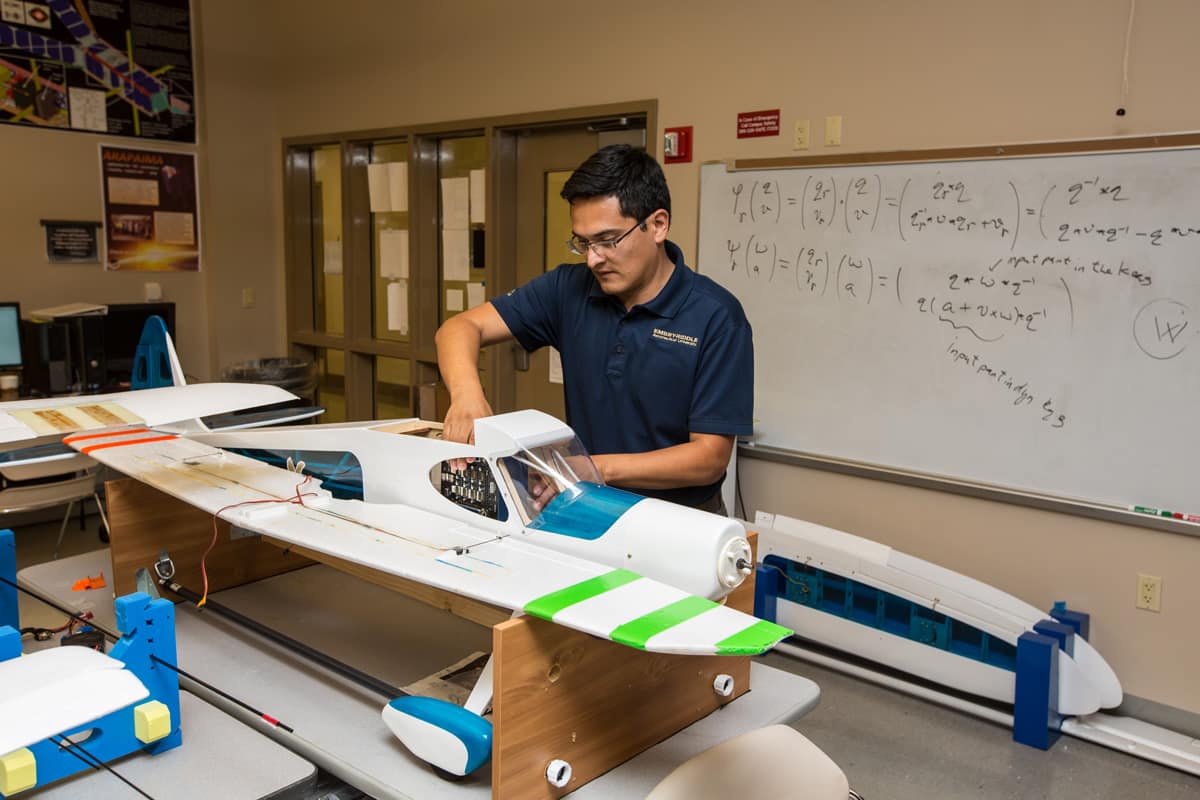 Man works on a model plane