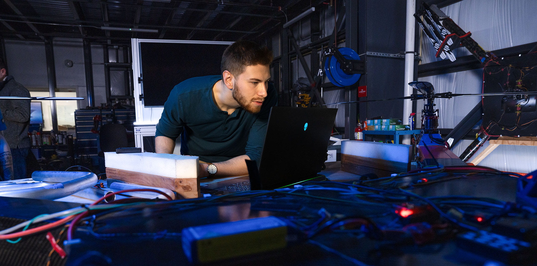 Embry-Riddle student works in a lab on flight research