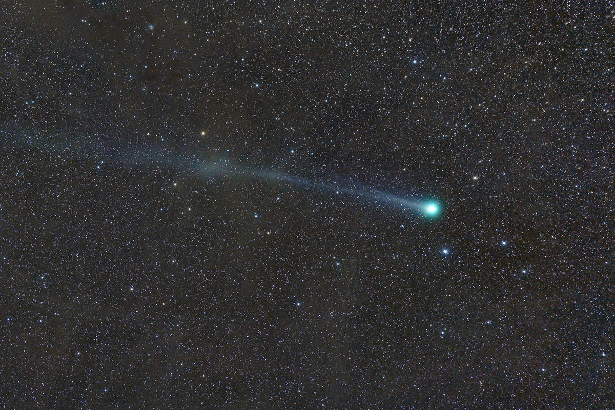 A comet shoots through space