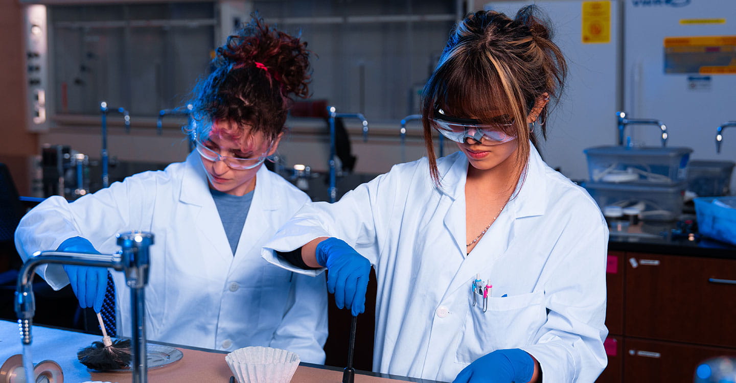 Two students in the lab