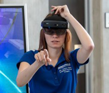 Embry-Riddle student wears a VR headset in the lab