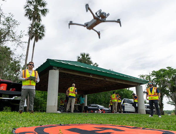 Student launches a Skydio UAV during a mission