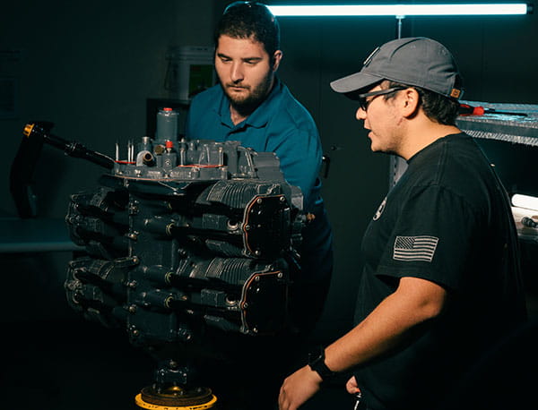Students in the Chandler Titus Engine Repair Station