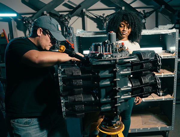 Students in the Chandler Titus Engine Repair Station