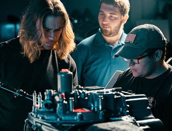 Students in the Chandler Titus Engine Repair Station