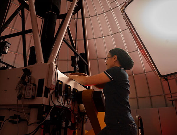 Desiree Robinson working on the Observatory telescope