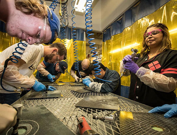 Students working in the Metallic Structures and Composites Lab