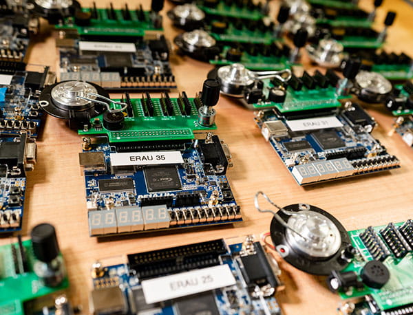 Computer chips sitting on a table in the Embry-Riddle Power Lab.