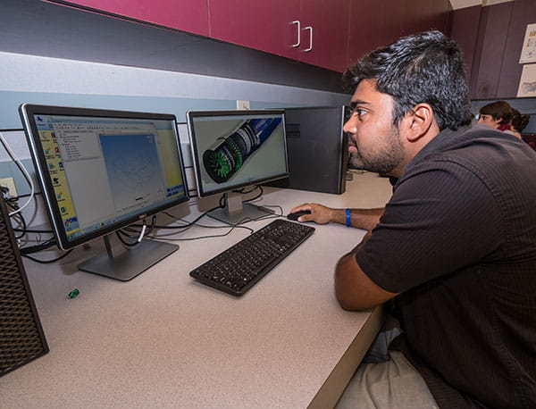 A student works with propulsion-focused software on a computer in the Propulsion Design Lab.